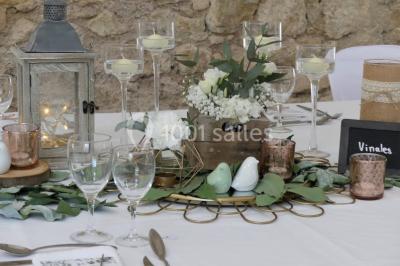 Miniature Location salle Montagnac (Hérault) - Domaine de la Grangette #16 Tente en toile beige installée sur un sol gravillonné, entourée d'arbres, avec des lits aménagés à l'intérieur.