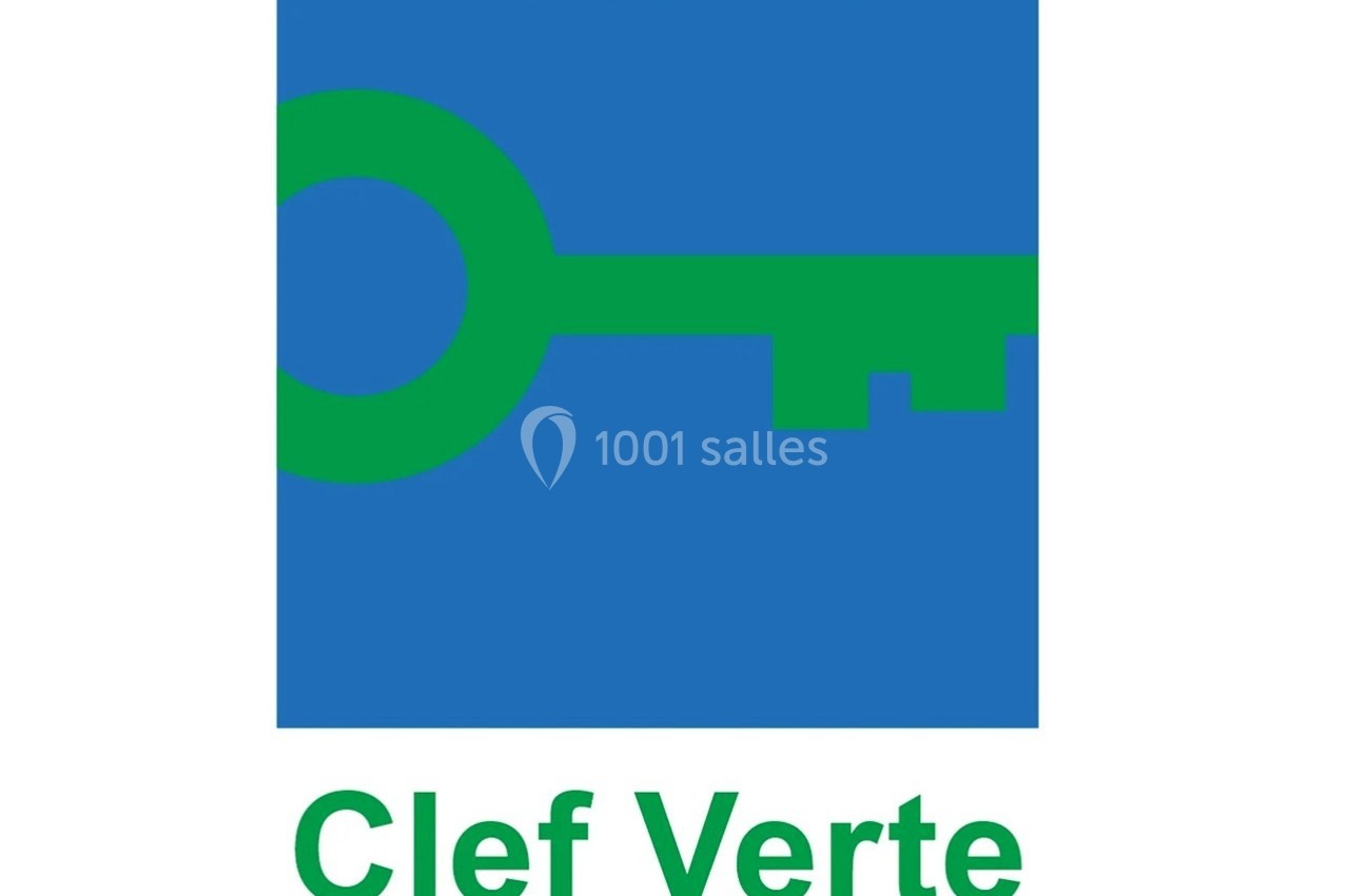 Logo de la Clef Verte avec une clé verte stylisée sur fond bleu.