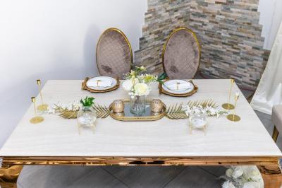 Miniature Location salle Villeneuve-lès-Maguelone (Hérault) - Salle de la Maguelone #5 Table en inox avec étagère inférieure dans une cuisine professionnelle équipée de fours et d'équipements.