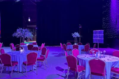 Miniature Location salle Paris 15 (Paris) - La Palmeraie #2 Salle de réception avec tables hautes noires, verres lumineux et éclairage tamisé dans une ambiance festive.