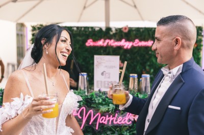 Miniature Location salle Coudoux (Bouches-du-Rhône) - Château Saint Hilaire #49 Un couple en tenue de mariage s'enlace dans un champ entouré d'oliviers sous une lumière douce.