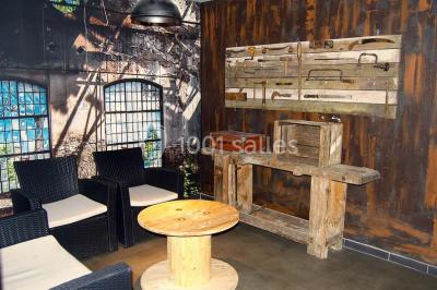 Miniature Location salle Fampoux (Pas-de-Calais) - L'hermitage de Fampoux #19 Salle sombre avec éclairage violet, plafond métallique, tables et chaises dispersées sur un sol à carreaux.