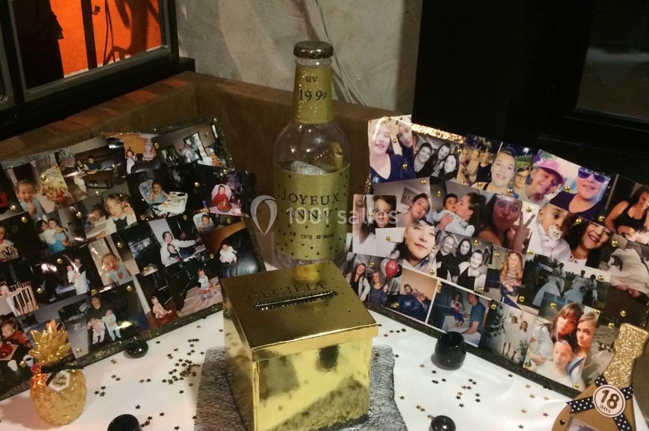 Montage photo festif avec souvenirs, bouteille de champagne ’Joyeux Anniversaire’ et boîte dorée décorative.