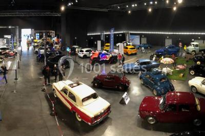 Miniature Location salle Dammarie-les-Lys (Seine-et-Marne) - Espace Pierre Bachelet #20 Entrée vitrée illuminée avec des plantes en pot disposées en rangées et éclairage coloré.