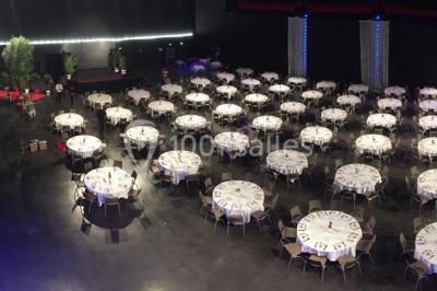 Miniature Location salle Dammarie-les-Lys (Seine-et-Marne) - Espace Pierre Bachelet #7 Entrée vitrée illuminée avec des plantes en pot disposées en rangées et éclairage coloré.