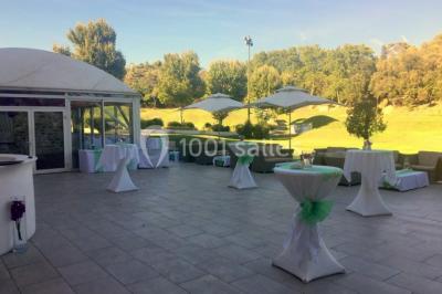 Miniature Location salle Marseille 11 (Bouches-du-Rhône) - La Bastide de la Salette #7 Bâtiment en pierre de style méditerranéen entouré d'arbres, avec une terrasse et une pelouse au premier plan.