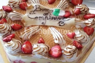 Miniature Traiteur Limas (Rhône) - Marc et Sophie Traiteur Cuisine & Services #23 Tour de choux décorée avec des fleurs et des étincelles, entourée de desserts sur une table de réception.