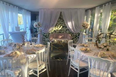 Miniature Location salle Jouy-le-Moutier (Val-d'Oise) - Le Yacht #30 Un parc verdoyant avec des arbres feuillus et une allée ensoleillée menant à un bâtiment blanc au loin.