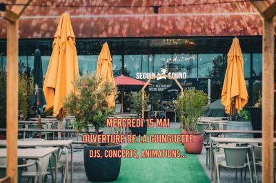 Miniature Location salle Boulogne-Billancourt (Hauts-de-Seine) - Seguin Sound #5 Tableau noir devant un établissement annonçant restauration, happy hour, musique live et club.