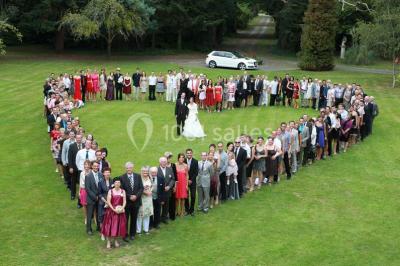 Miniature Location salle La Chapelle-Heulin (Loire-Atlantique) - Château Cassemichère #14 Rangées de tonneaux en bois alignés dans une cave voûtée avec éclairage tamisé.