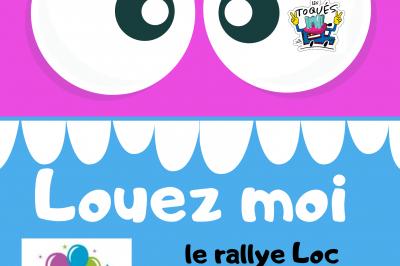 Miniature Le Rallye Loc #3 Structure gonflable jungle avec animaux et toboggan, entourée de feuilles, avec détails de location et caractéristiques.