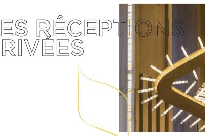 Des assiettes garnies de poisson et légumes sont préparées en cuisine avant d’être servies.