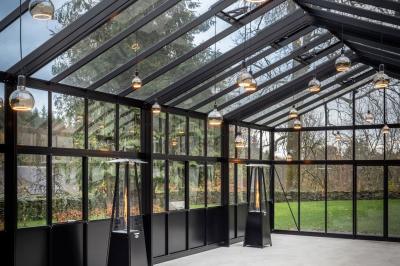 Miniature Location salle Habay (Luxembourg) - Château du Pont d'Oye #14 Façade d'une maison en pierre avec porte beige, fenêtres blanches et environnement boisé en arrière-plan.