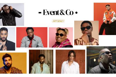 Miniature Event&co Art'gency #2 Un homme déguisé en Père Noël lit une lettre avec deux enfants souriants dans un décor chaleureux.