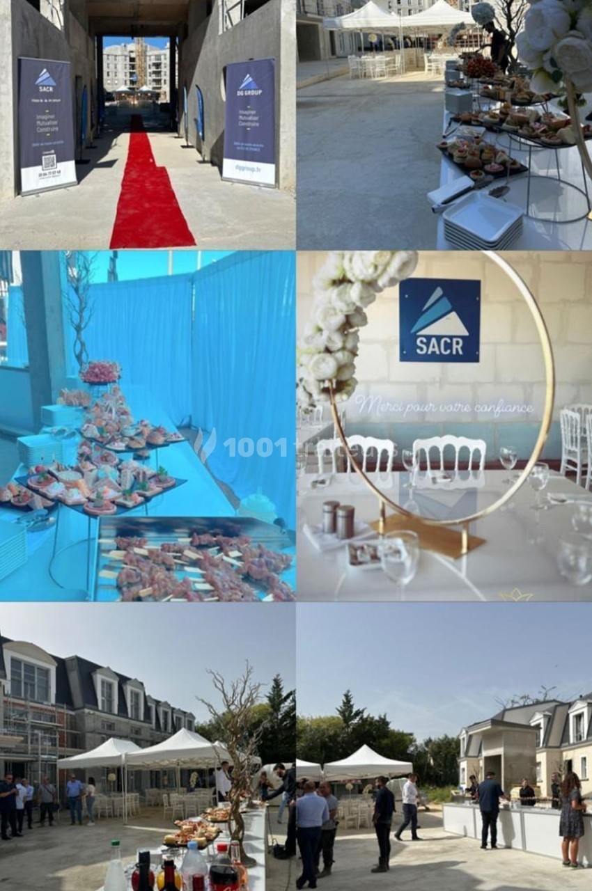 Événement en extérieur avec buffet, décoration élégante, tables dressées et espace sous tente dans un cadre urbain.