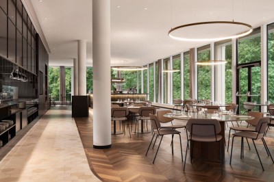 Miniature Le restaurant Argan du Dolce La Hulpe Brussels Femme assise dans un hammam aux carreaux roses, enveloppée dans une serviette blanche.