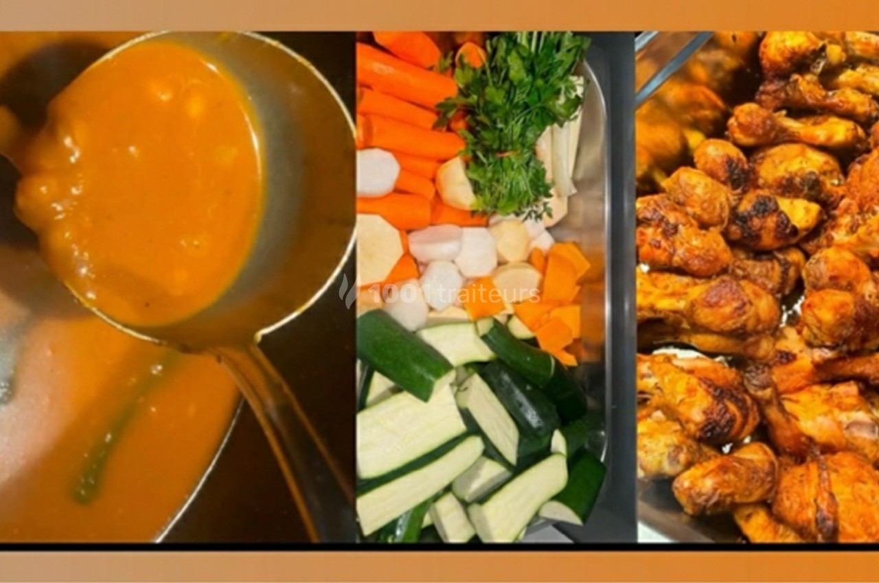 Soupe orange servie avec une louche, légumes frais coupés et pilons de poulet grillés disposés dans des plats.